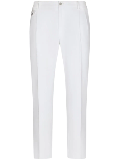 Shop Dolce & Gabbana Tapered Cotton Trousers In White