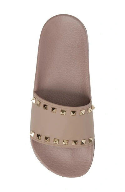 Shop Valentino Rockstud Slide Sandal In Poudre