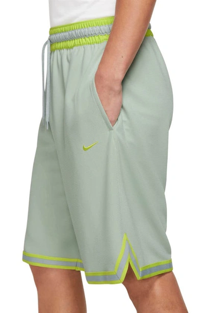 Shop Nike Dri-fit Dna Mesh Shorts In Seafoam/atomic Green