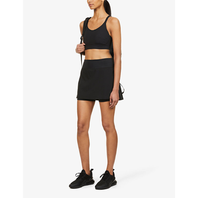 Shop Spanx Get Moving Mid-rise Stretch-woven Skort In Black