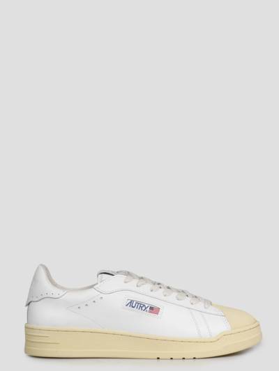 Shop Autry Bob Lutz Sneakers In White