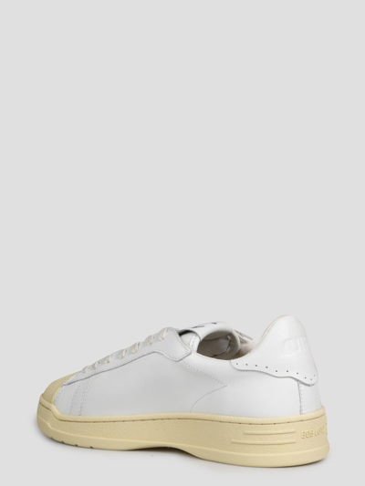 Shop Autry Bob Lutz Sneakers In White