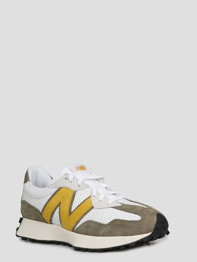 Shop New Balance 327 Sneakers In White