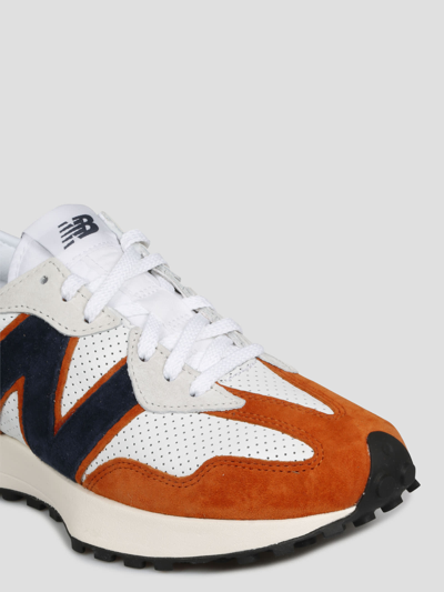 Shop New Balance 327 Sneakers In White