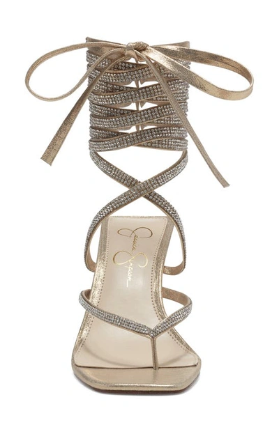 Shop Jessica Simpson Kelsa Ankle Tie Thong Sandal In Gold Textile