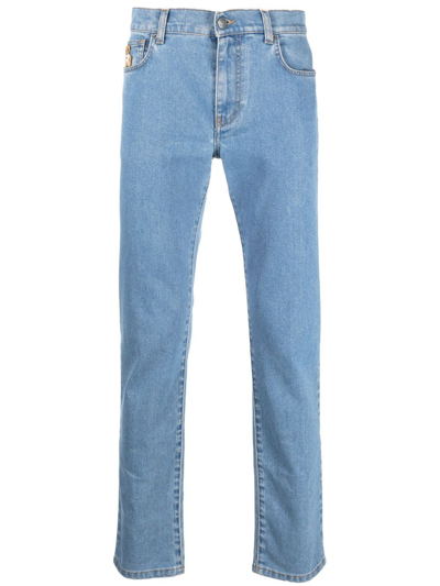 Shop Moschino Logo Slim-fit Jeans In Blue