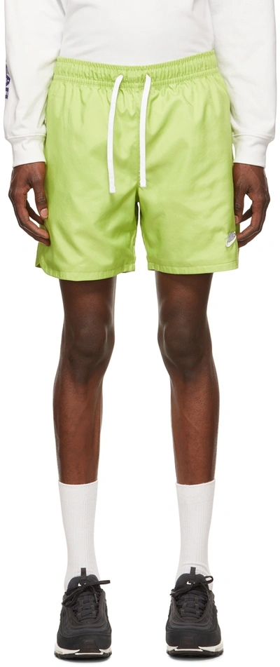 Shop Nike Green Polyester Shorts In Vivid Green/white