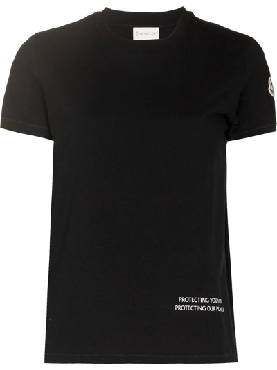 Shop Moncler Slogan-print T-shirt In Black