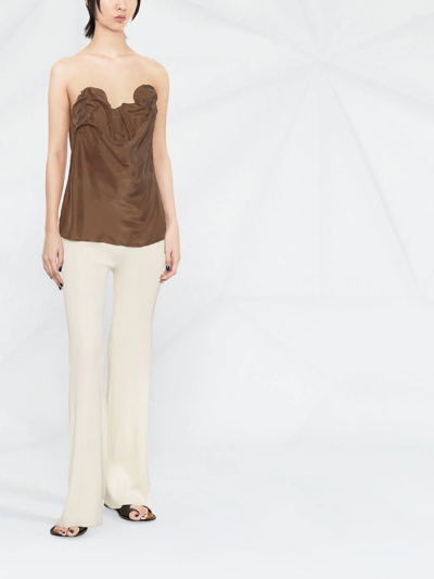 Shop Totême Cowl-effect Strapless Blouse In Brown