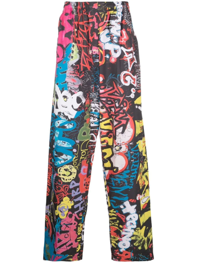 Shop Vetements Graffiti-print Trousers In Black