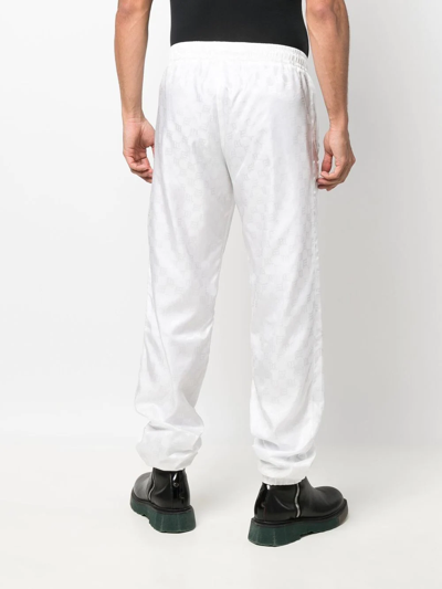 Shop Misbhv Monogram-print Elasticated-waist Track Pants In White
