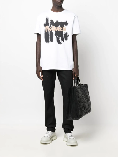 Alexander Mcqueen Washed-black Cotton-blend Skinny-cut Denim Jeans