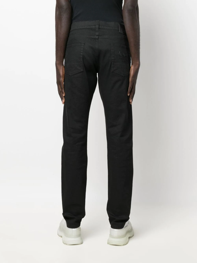Alexander Mcqueen Washed-black Cotton-blend Skinny-cut Denim Jeans