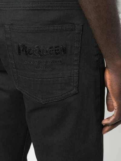 Alexander Mcqueen Washed-black Cotton-blend Skinny-cut Denim Jeans