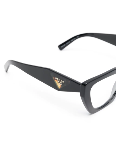 Shop Prada Logo-engraved Cat-eye Glasses In Black
