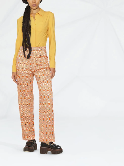 Shop Colville Abstract-print Trousers In Orange