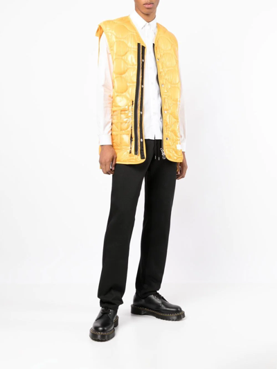 Shop Takahiromiyashita The Soloist Quilted Transparent Pocket Gilet In Yellow