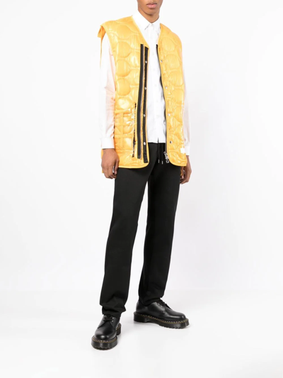 Takahiromiyashita The Soloist Quilted Transparent Pocket Gilet In Yellow