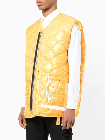Takahiromiyashita The Soloist Quilted Transparent Pocket Gilet In Yellow