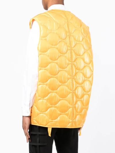 Takahiromiyashita The Soloist Quilted Transparent Pocket Gilet In Yellow