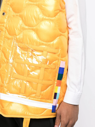 Takahiromiyashita The Soloist Quilted Transparent Pocket Gilet In Yellow