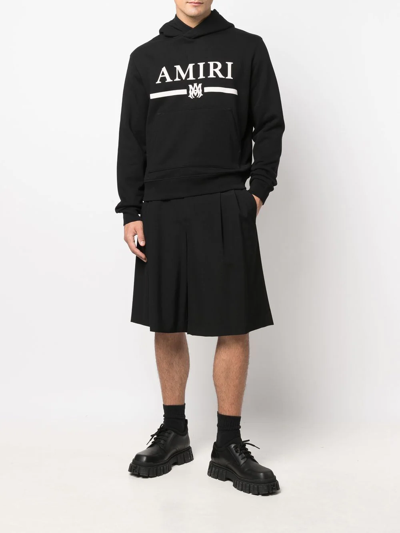 Shop Amiri Logo-print Cotton Hoodie In Black