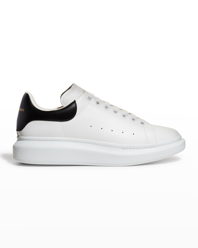 Shop Alexander Mcqueen Men's Oversized Larry Bicolor Leather Low-top Sneakers In White/black