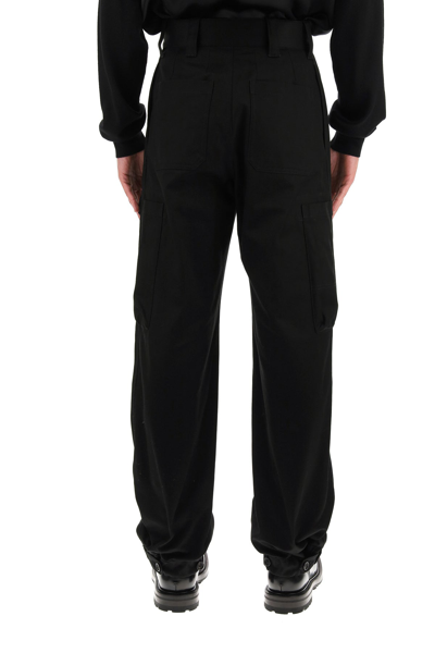 Shop Alexander Mcqueen Cargo Trousers In Black