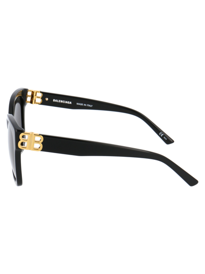 Shop Balenciaga Sunglasses In 001 Black Gold Grey