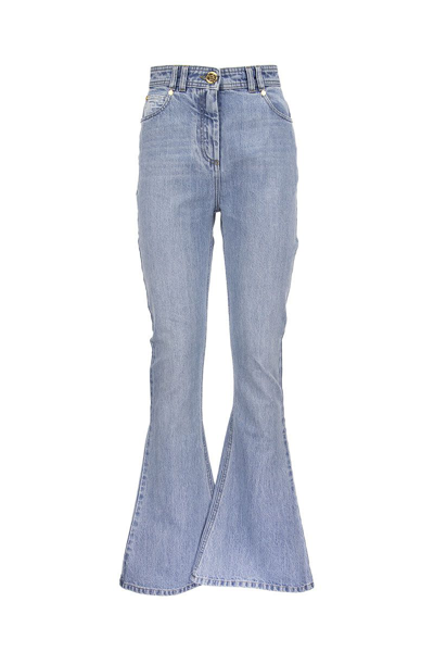 Shop Balmain Monogram-detail Flared Jeans In Light Denim