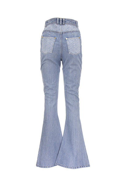 Shop Balmain Monogram-detail Flared Jeans In Light Denim