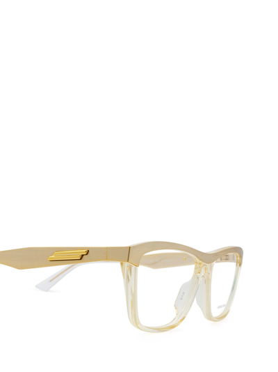 Shop Bottega Veneta Eyeglasses In Gold &amp; Transparent Beige