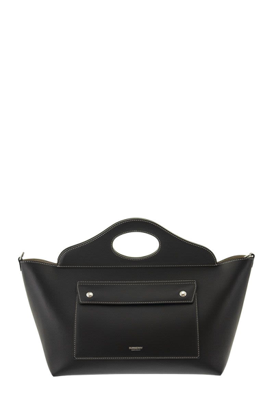 Shop Burberry Small Tote Pocket Bag In Soft Leather In Black