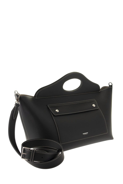 Shop Burberry Small Tote Pocket Bag In Soft Leather In Black