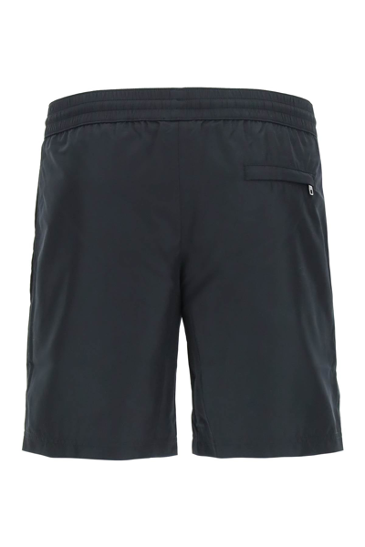 Shop Dolce & Gabbana Swim Trunks With Logo Plaque In Black