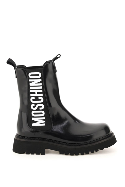 Shop Moschino Logo Combat Boots In Black