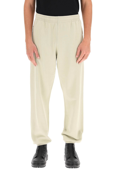 Shop Off-white Arrows Sweatpants In Beige