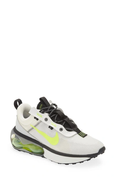 Shop Nike Air Max 2021 Sneaker In White/ Volt/ Dust/ Black