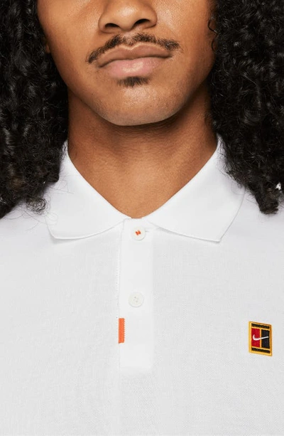 Shop Nike Slim Fit Polo In White