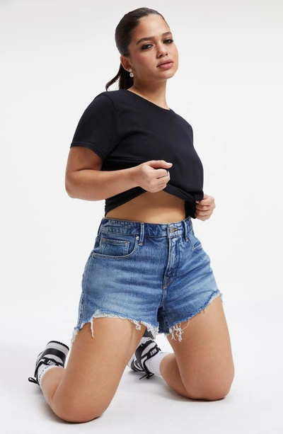 Shop Good American Good Girlfriend Cutoff Denim Shorts In Indigo109