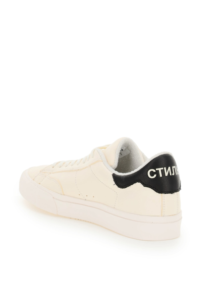 Shop Heron Preston Vulcanized Low Top Sneakers In White Black (white)