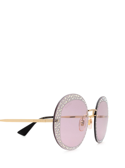 Shop Gucci Gg0899s Gold Sunglasses