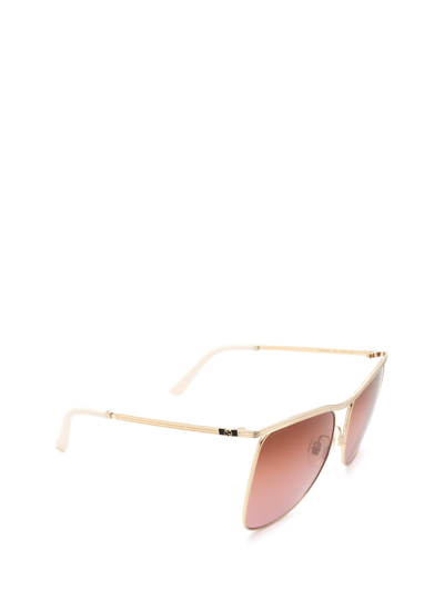 Shop Gucci Gg0820s Gold Sunglasses