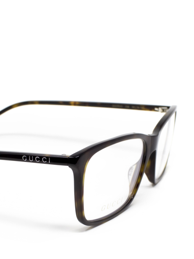 Shop Gucci Gg0553o Havana Glasses