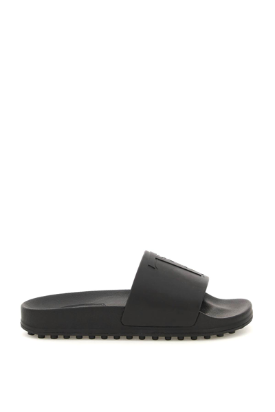 Shop Tod's Monogram Rubber Slides