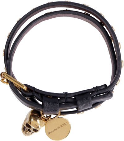 Shop Alexander Mcqueen Leather Bracelet With Metal Logo Pendant And Skull In Black