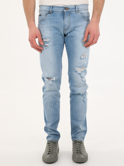 Shop Dolce & Gabbana Skinny Jeans With Rips In Blu Denim