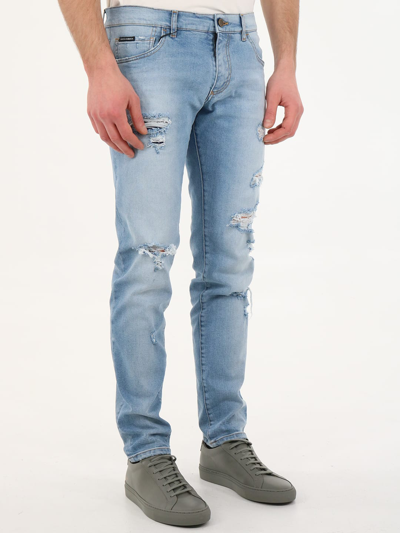 Shop Dolce & Gabbana Skinny Jeans With Rips In Blu Denim