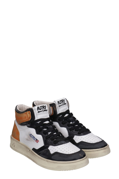 Shop Autry Sup Vintage Sneakers In White Leather In Bianco/marrone