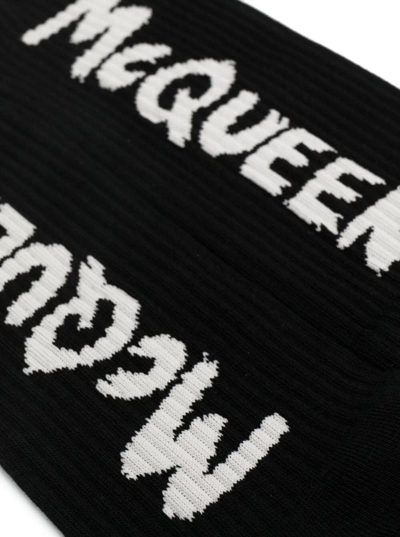 Shop Alexander Mcqueen Black Socks With Graffiti Logo Print